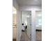 Hallway view leading to bedrooms with neutral carpet and white trim, offering a comfortable transition at 3403 Keith Dr, Charlotte, NC 28269