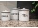 Stylish kitchen decor with charming tea, coffee, and sugar canisters on granite countertops at 3403 Keith Dr, Charlotte, NC 28269