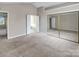 Bedroom with a mirrored closet and connecting bathroom and closet, ideal for privacy and storage at 3826 Yorkford Dr, Charlotte, NC 28269