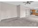 Open living room and kitchen concept featuring tile floors and stainless steel appliances at 3826 Yorkford Dr, Charlotte, NC 28269
