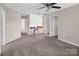 Spacious loft area with neutral walls, plush carpet, and bright light at 3826 Yorkford Dr, Charlotte, NC 28269