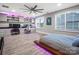 Bedroom with bright light and purple accent lighting, creating a vibrant and comfortable space at 4049 Shadowbrook Rd, Waxhaw, NC 28173