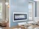 Dining area showcasing a fireplace, stylish lighting, and elegant decor at 4049 Shadowbrook Rd, Waxhaw, NC 28173