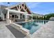 A luxurious outdoor pool surrounded by a patio, perfect for relaxation and entertaining at 4049 Shadowbrook Rd, Waxhaw, NC 28173