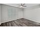 Well-lit bedroom with stylish flooring and a large window offering a pleasant view at 409 W 8Th St, Charlotte, NC 28202