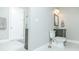 Bathroom with modern vanity, mirror, toilet and walk in shower at 424 Cassia Ct, Fort Mill, SC 29708