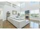 Spacious living room with stone fireplace, hardwood floors, and abundant natural light at 424 Cassia Ct, Fort Mill, SC 29708