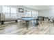 Recreation room with ping pong and foosball tables with large windows at 424 Cassia Ct, Fort Mill, SC 29708