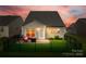 This backyard includes a lovely patio, perfect for entertaining with outdoor seating at 4511 Middlebury Ln, Fort Mill, SC 29715