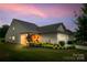 Attractive exterior featuring a well-maintained lawn, and an attached two-car garage at 4511 Middlebury Ln, Fort Mill, SC 29715