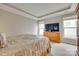 Spacious main bedroom featuring tray ceiling, neutral walls, and sun-filled windows at 4511 Middlebury Ln, Fort Mill, SC 29715