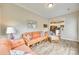 Cozy sunroom featuring rattan furniture and easy access to other living spaces and bright, natural light at 4511 Middlebury Ln, Fort Mill, SC 29715