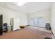 Unfinished basement offering ample storage, potential recreation space, and access to the outdoors at 4527 Marshall Ct, Monroe, NC 28110