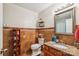 The bathroom includes granite countertops, decorative shelves, and tiled walls at 4527 Marshall Ct, Monroe, NC 28110