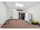 Bonus room featuring extra refrigerators and access to the house and backyard at 4527 Marshall Ct, Monroe, NC 28110