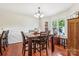 Bright dining room with hardwood floors, perfect for Gathering meals and gatherings, with natural light at 4527 Marshall Ct, Monroe, NC 28110