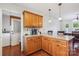Functional kitchen area featuring an island with seating and seamless flow into other living spaces in the house at 4527 Marshall Ct, Monroe, NC 28110