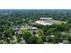 Neighborhood view featuring a charming home near Montclaire Elementary School, surrounded by green trees at 5929 Brookhaven Rd, Charlotte, NC 28210