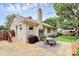 Backyard patio area with outdoor dining set, perfect for enjoying meals and entertaining at 5929 Brookhaven Rd, Charlotte, NC 28210