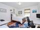 Sunny bedroom with hardwood floors, neutral walls and a large window at 5929 Brookhaven Rd, Charlotte, NC 28210