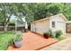 Detached garage with adjacent deck area, offering convenience and outdoor living space at 5929 Brookhaven Rd, Charlotte, NC 28210