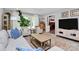 Inviting living room with stylish furniture, large windows, and a decorative rug at 5929 Brookhaven Rd, Charlotte, NC 28210