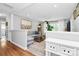 Cozy living room with ample seating, white trim, natural light, and an open floor plan at 5929 Brookhaven Rd, Charlotte, NC 28210