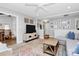 Comfortable living room with modern decor, including a TV and stylish furniture, creating an inviting space at 5929 Brookhaven Rd, Charlotte, NC 28210