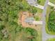 An aerial view of a quiet neighborhood showcasing the property and a beautiful wooden landscape at 6010 Hawk View Rd, Waxhaw, NC 28173