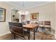 Charming dining room area with wooden table, chairs, unique light fixture, and stylish decor at 6010 Hawk View Rd, Waxhaw, NC 28173