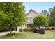 Attractive home with manicured landscaping, a three-car garage, and a beautifully maintained lawn at 6010 Hawk View Rd, Waxhaw, NC 28173