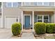 Charming home featuring a welcoming front porch and beautifully manicured shrubbery at 6010 Hawk View Rd, Waxhaw, NC 28173