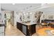This kitchen features an island with stainless steel appliances and pendant lighting at 6010 Hawk View Rd, Waxhaw, NC 28173