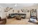 A living room showcasing a staircase and a comfortable couch, perfect for relaxation at 6010 Hawk View Rd, Waxhaw, NC 28173