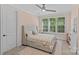 Inviting bedroom features carpet, an upholstered bed, and great natural light from large windows at 6013 Camile Ct, Charlotte, NC 28226