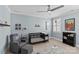 Charming Bedroom with a black crib, gray glider chair, and a planet themed area rug at 6013 Camile Ct, Charlotte, NC 28226
