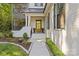 Close-up of the home's entryway, highlighting the decorative glass front door and covered porch at 6013 Camile Ct, Charlotte, NC 28226