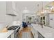 Open concept kitchen with stainless appliances and large island at 6013 Camile Ct, Charlotte, NC 28226