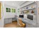 Bright office with lots of natural light, hardwood floors and built in shelving at 6013 Camile Ct, Charlotte, NC 28226