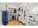 Spacious walk-in closet with custom shelving and organization system, plus laundry area access at 6013 Camile Ct, Charlotte, NC 28226