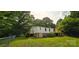 This home features a spacious, grassy backyard surrounded by mature trees, offering a private outdoor retreat at 6140 Barclay Ln, Clover, SC 29710