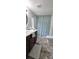 Bathroom featuring vanity, toilet, tub, shower, and patterned shower curtain at 6140 Barclay Ln, Clover, SC 29710