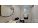 Bathroom featuring a vanity and toilet with a window behind at 6140 Barclay Ln, Clover, SC 29710