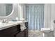 Bathroom featuring vanity, toilet, tub, shower, and patterned shower curtain at 6140 Barclay Ln, Clover, SC 29710