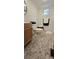 Bathroom with wood vanity and white tile floor at 6140 Barclay Ln, Clover, SC 29710