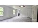 Bedroom with windows, closet, and view into adjacent bathroom at 6140 Barclay Ln, Clover, SC 29710