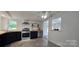 Modern kitchen featuring stainless steel appliances, blue cabinets, and wood countertops at 6140 Barclay Ln, Clover, SC 29710