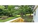 Inviting yard surrounded by lush greenery, offering both privacy and a sense of tranquility at 6140 Barclay Ln, Clover, SC 29710
