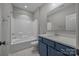 This full bathroom features a shower and a sink with drawers at 6531 Wildbrook Dr, Charlotte, NC 28269