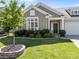 Charming home with manicured lawn and beautiful landscaping, enhancing curb appeal at 6531 Wildbrook Dr, Charlotte, NC 28269